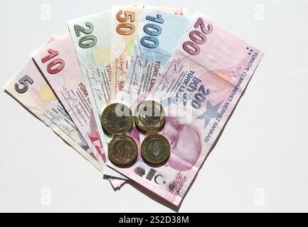Colorful Turkish Lira Banknotes and Coins isolated on white Stock Photo