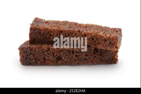 Several rye crackers with spices isolated on white. Stock Photo