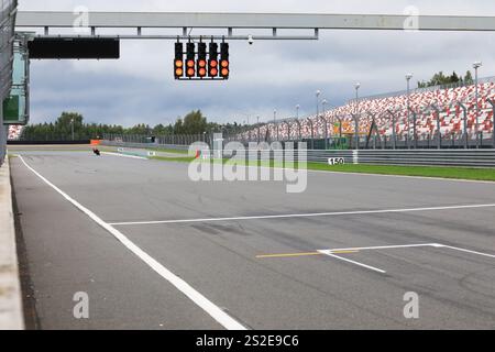 MOSCOW, RUSSIA - JULY 21, 2019: Finishing line with the red lights on the race track during the championship of Russia in motorcycle racing RSBK 2019 Stock Photo