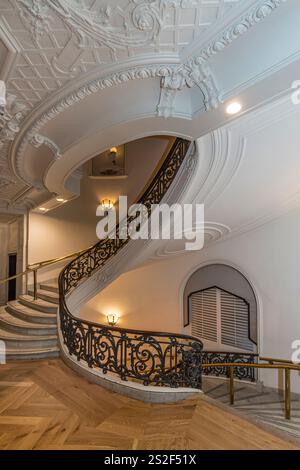 Spiral staircase, lobby of The Bellvue Stock Photo