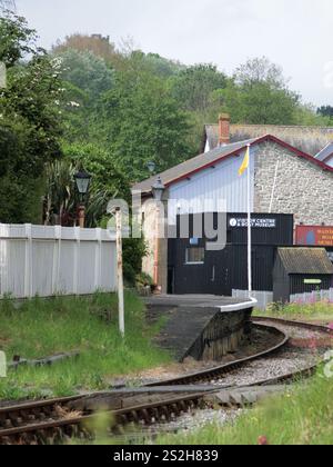 Watchet Station On The West Somerset Railway With Watchet Boat Museum & Visitor Centre Beyond, Somerset, England, UK in May Stock Photo