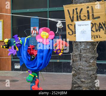 New Orleans, LA, USA - January 4, 2025: Closeup of cross for Nikyra Cheyenne Dedeaux with photo, flowers and stuffed animals left by mourners as a memorial for her as one of 14 people killed by a domestic terrorist who drove on Bourbon Street in his truck to kill New Year's celebrants. Shamsud-Din Jabbar, from Texas, was identified as the driver of the truck. He was killed by police at the scene after he killed 14 people with his truck. Stock Photo