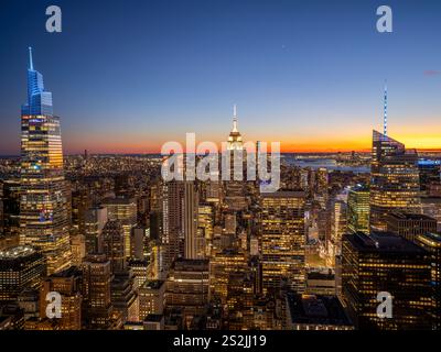 Colorful Manhattan Skyline, illuminated at Blue Hour after Sunset Manhattan, New York City New York, USA Stock Photo