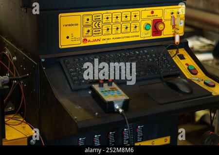 Bobruisk, Belarus - June 27: A detailed view of a CNC plasma cutting system with control panel and keyboard. This advanced machinery is used for preci Stock Photo