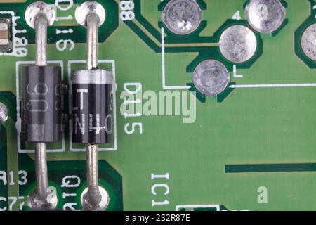 Diodes on a green circuit board Stock Photo