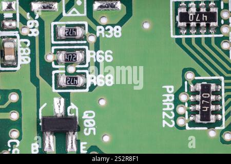 Close up of electronic resistors on PCB Stock Photo