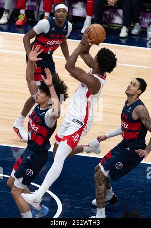 Houston Rockets forward Amen Thompson (1) dunks against the New Orleans ...