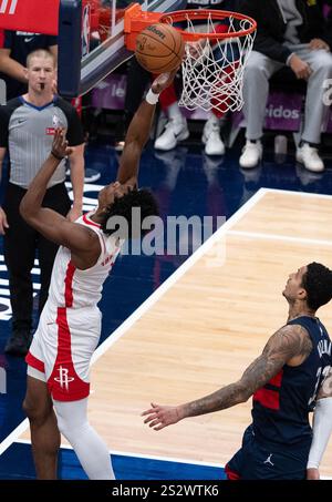 Houston Rockets forward Amen Thompson (1) blocks a shot by Miami Heat ...