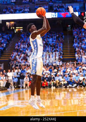 January 7, 2025: North Carolina freshman Ian Jackson (11) drives to ...