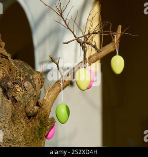 Tree decorated with Easter eggs during the Easter holidays in the city center of Berlin, Germany Stock Photo