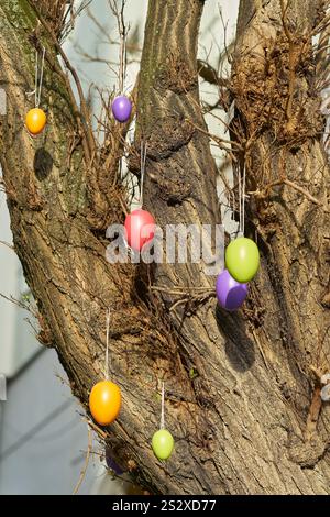 Tree decorated with Easter eggs during the Easter holidays in the city center of Berlin, Germany Stock Photo