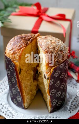 Panettone is a traditional Italian sweet bread, rich with dried fruits and citrus, often enjoyed during the holidays. Stock Photo