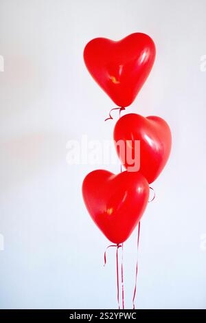Heart shaped balloons on an isolated white background Stock Photo