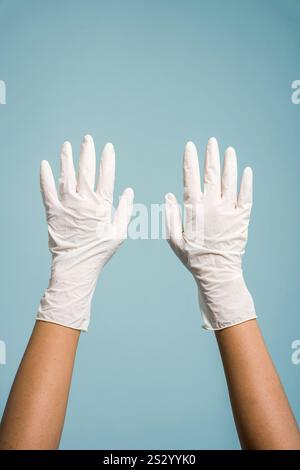 woman doctor hands in protective gloves Stock Photo