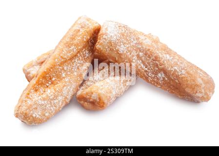 Studio shot of twisted doughnuts known in the UK as Yum Yums cut out against a white background - John Gollop Stock Photo