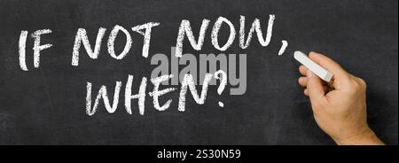 Text written on a blackboard -  If not now, when Stock Photo