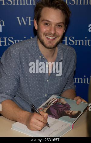 John Whaite signs his new cookbook "John Whaite Bakes at Home" at WH