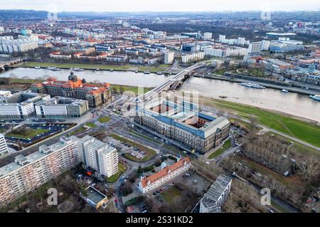 Dresden, Germany. 08th Jan, 2025. View of the old town and the new town on the Elbe. A bomb has been found during demolition work on the partially collapsed Carola Bridge in Dresden. The exclusion zone, which must be evacuated beforehand, is currently being drawn up. (Aerial view with drone) Credit: Robert Michael/dpa/Alamy Live News Stock Photo