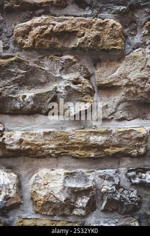 A close-up of an old stone wall. Stock Photo