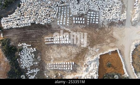 Aerial panorama of marble quarries in Burdur, Turkey. Marble quarry top view. Marble quarry in high altitude mountains. Stock Photo