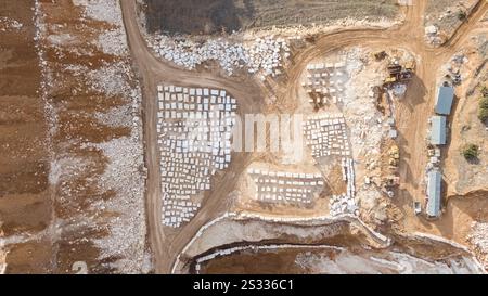 Aerial panorama of marble quarries in Burdur, Turkey. Marble quarry top view. Marble quarry in high altitude mountains. Stock Photo