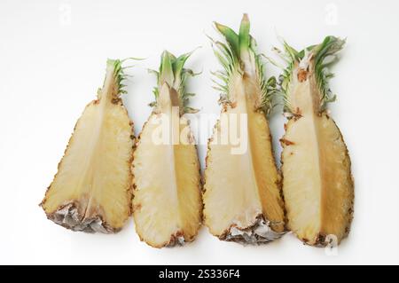 A pineapple cut into pieces for consumption. Stock Photo