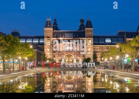 Rijksmuseum in Amsterdam, The Netherlands, during blue hour. Architect: Pierre Cuypers. Stock Photo