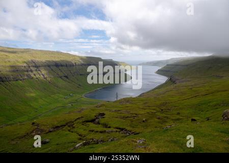 Aerial panoramic view over Kaldbaksbotnur, typical Faroese landscape. Stock Photo