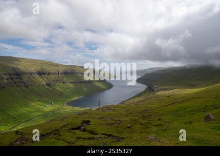 Aerial panoramic view over Kaldbaksbotnur, typical Faroese landscape. Stock Photo