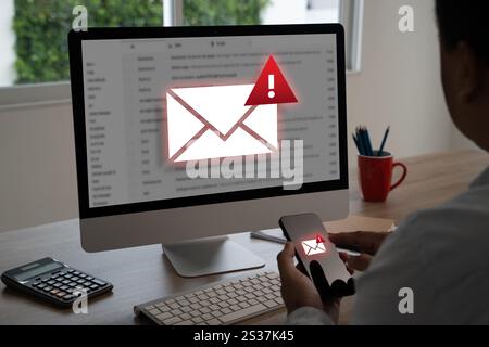 men using smartphones warning alert, email hack SMS spam, fake text message phishing Stock Photo