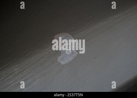 Wood paint peeling off The wall is dirty and has a rough texture Stock Photo
