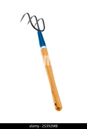 Rake hanging isolated on white background. Rake hanging isolated on white Stock Photo
