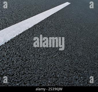 White dotted line on city asphalt road background Stock Photo