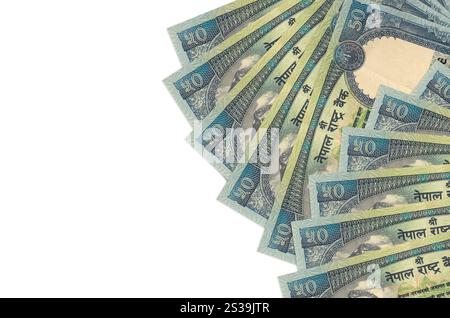 50 Nepalese rupees bills lies isolated on white background with copy space. Rich life conceptual background. Big amount of national currency wealth Stock Photo