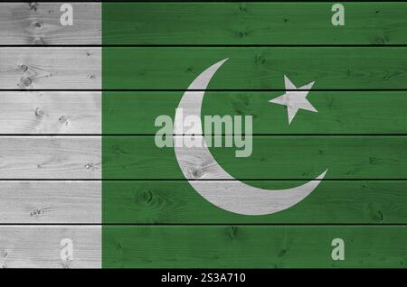 Pakistan flag is depicted on a wooden background close-up Stock Photo ...