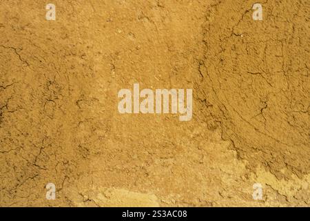 Abstract clay wall grunge texture background interior decoration mud wall texture Sandstone texture Natural background Stock Photo