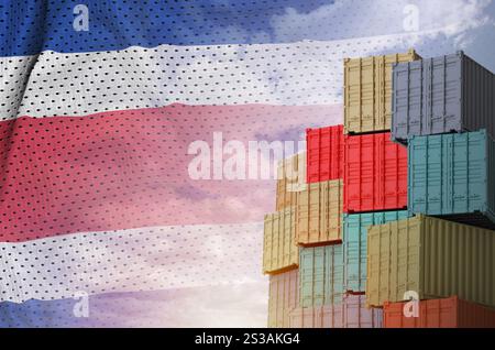 Costa Rica flag and big stack of shipping cargo containers in docks ...