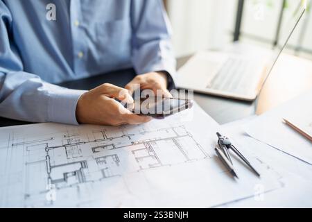 Architecture Man drawing on architectural Creative project business architecture building construction Industrial engineering Achievement Planning. Stock Photo