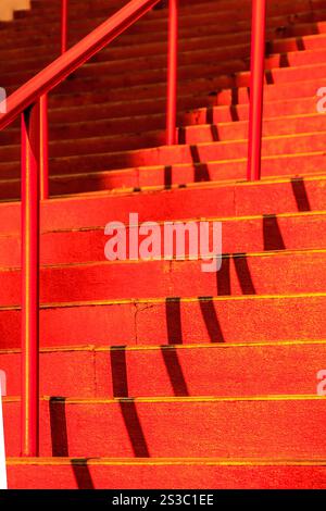Stairs Railing Red Abstract modern red stairs with warm light - stairway composition Stock ...
