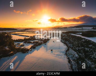 Sunset over snowy fields in the Wicklow Mountains Stock Photo