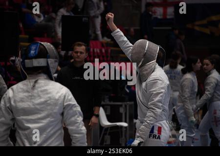 Two fencing champions clash in an intense tournament match, showcasing their skill and precision in this thrilling sport Stock Photo