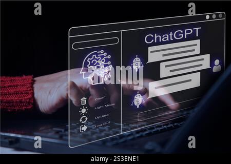 ChatGPT Chat with AI or Artificial Intelligence. Young businessman chatting with a smart AI or artificial intelligence using an artificial intelligenc Stock Photo