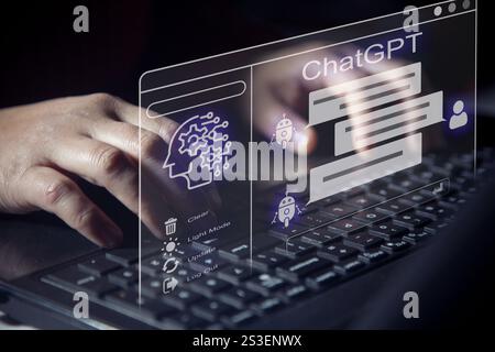 ChatGPT Chat with AI or Artificial Intelligence technology Entrepreneur using a laptop computer chatting with an intelligent artificial intelligence a Stock Photo