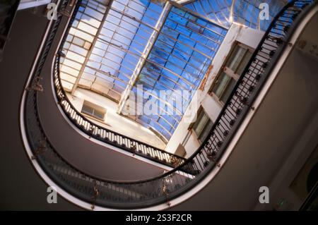 Looking up at glass roof canopy of Barton Arcade in Manchester Stock Photo