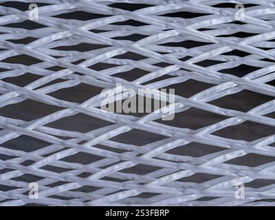 Foam mesh packaging for wine bottles. Close up. Stock Photo