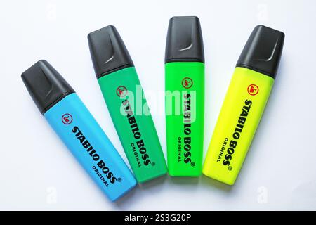 Itterbeck, Germany - Oct 12 2024 Stabilo boss highlighters in 4 colors: yellow, light green, dark green,  blue.  Isolated on white background, top vie Stock Photo