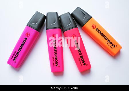 Itterbeck, Germany - Oct 12 2024 Stabilo boss highlighters with 4 colors,: pink, red, purple, orange. Isolated on white background, top view Stock Photo