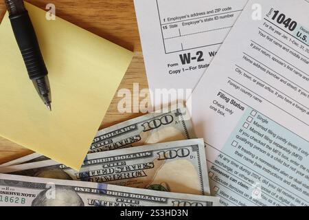 IRS 1040 and W-2 tax forms, close up, top down view Stock Photo