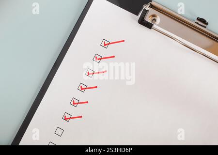 Checklist boxes close up with red ticks, check marks Stock Photo