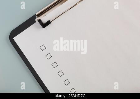 Checklist boxes close up on white paper, unchecked Stock Photo